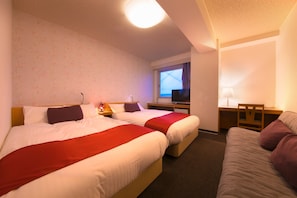 A hotel room with two beds, a desk, a TV, and a window. - Smile Hotel Anan (Anan)