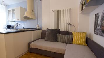 Apartamento (1 Bedroom) | Zona de estar | Una televisión de pantalla plana