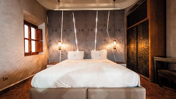 Ropa de cama de alta calidad y minibar