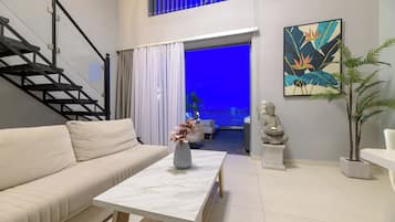 Apartment, 2 Bedrooms, Sea View | Living area | Flat-screen TV
