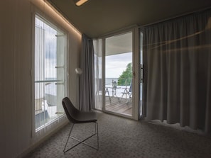 Apartment, 1 Bedroom, Non Smoking, Sea View | Living area | Flat-screen TV