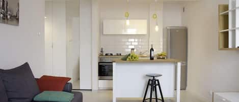 Design-Apartment, 1 Doppelbett und Schlafsofa | Wohnzimmer | Flachbildfernseher