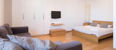 Ropa de cama de alta calidad y tabla de planchar con plancha