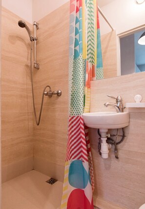 Design Studio, 1 Double Bed with Sofa bed | Bathroom | Shower, hair dryer, towels