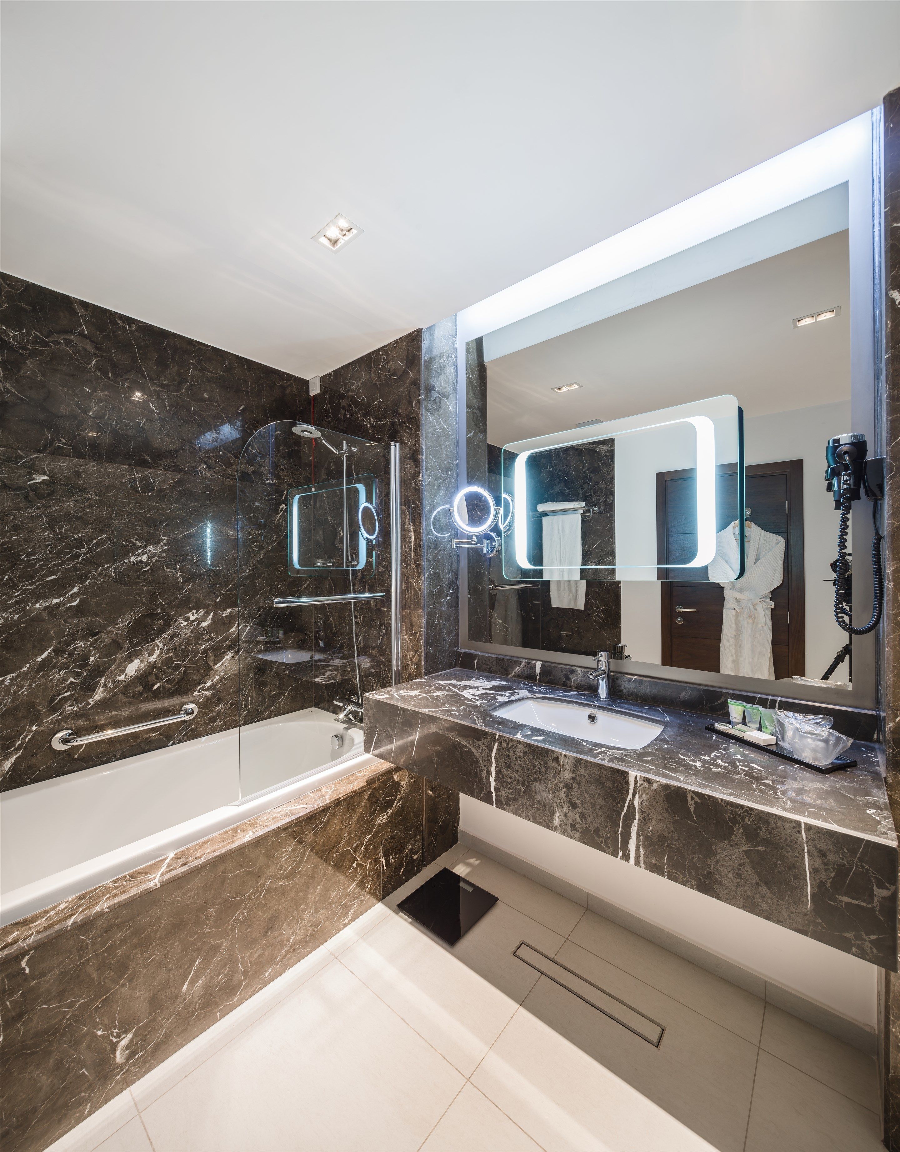 combined shower/bathtub, free toiletries, hair dryer, bathrobes