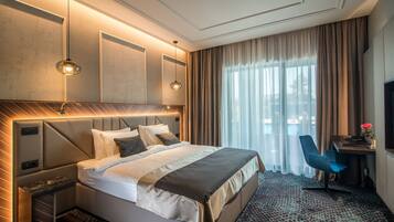 Quarto solteiro luxo, sacada | Frigobar, cofres nos quartos, escrivaninha