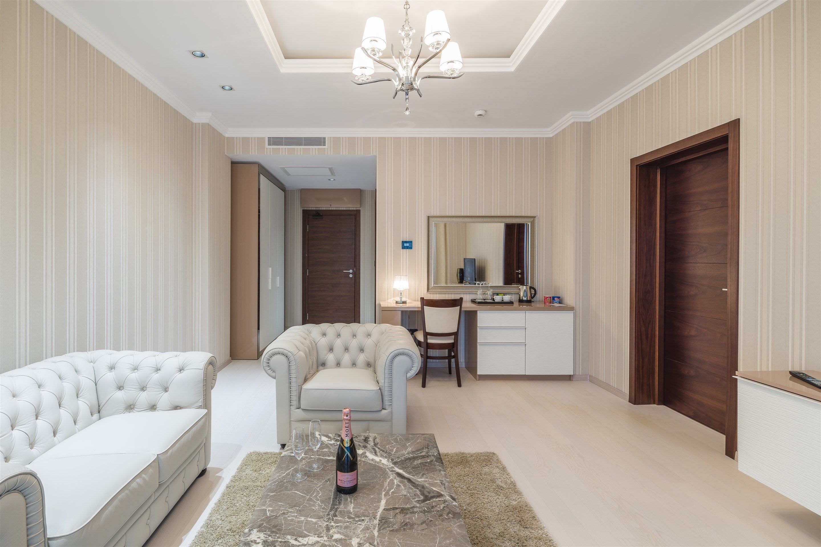 suite, 1 bedroom, balcony, pool view | living room | smart tv, books