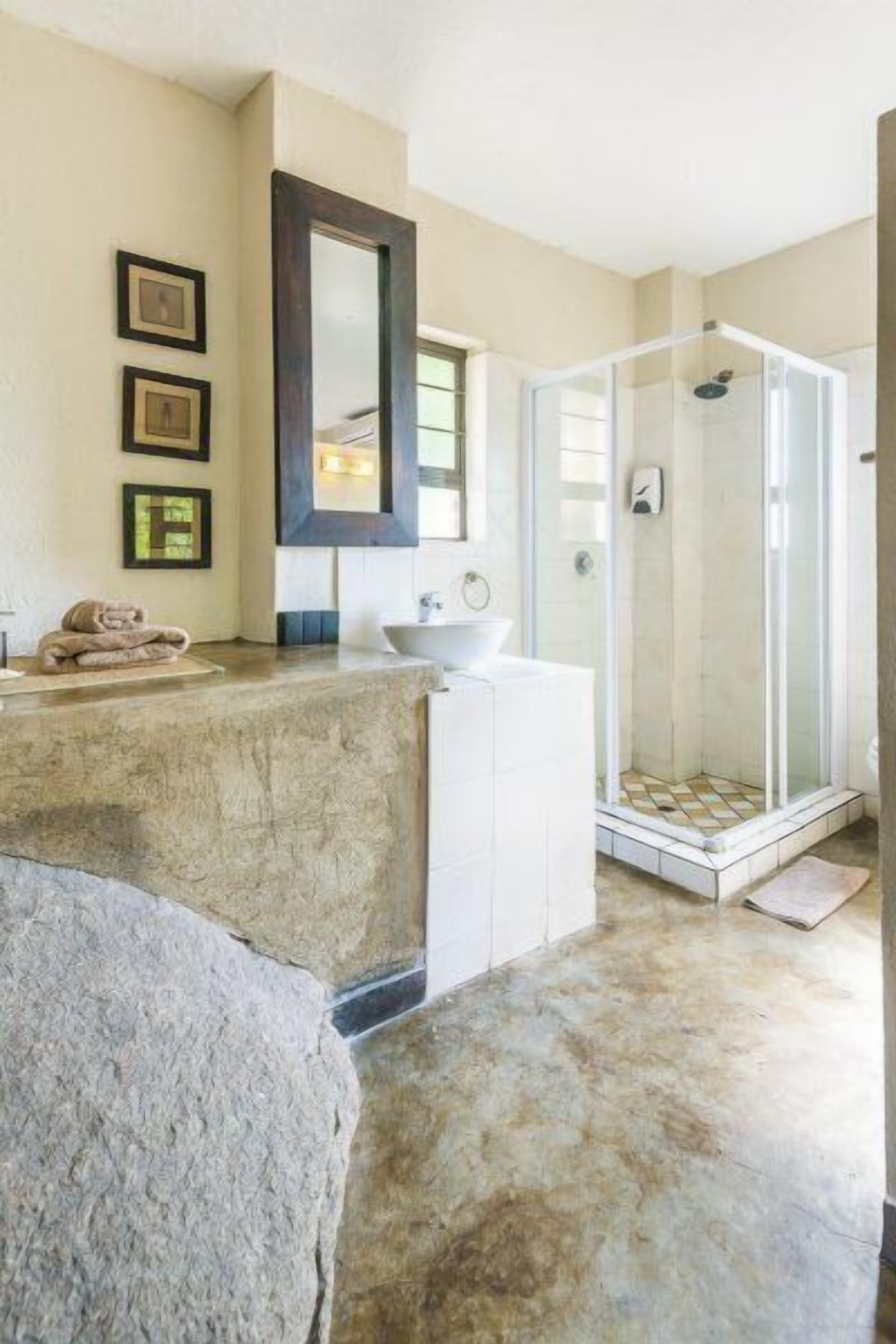 Deep-soaking bathtub, rainfall showerhead, free toiletries, hair dryer