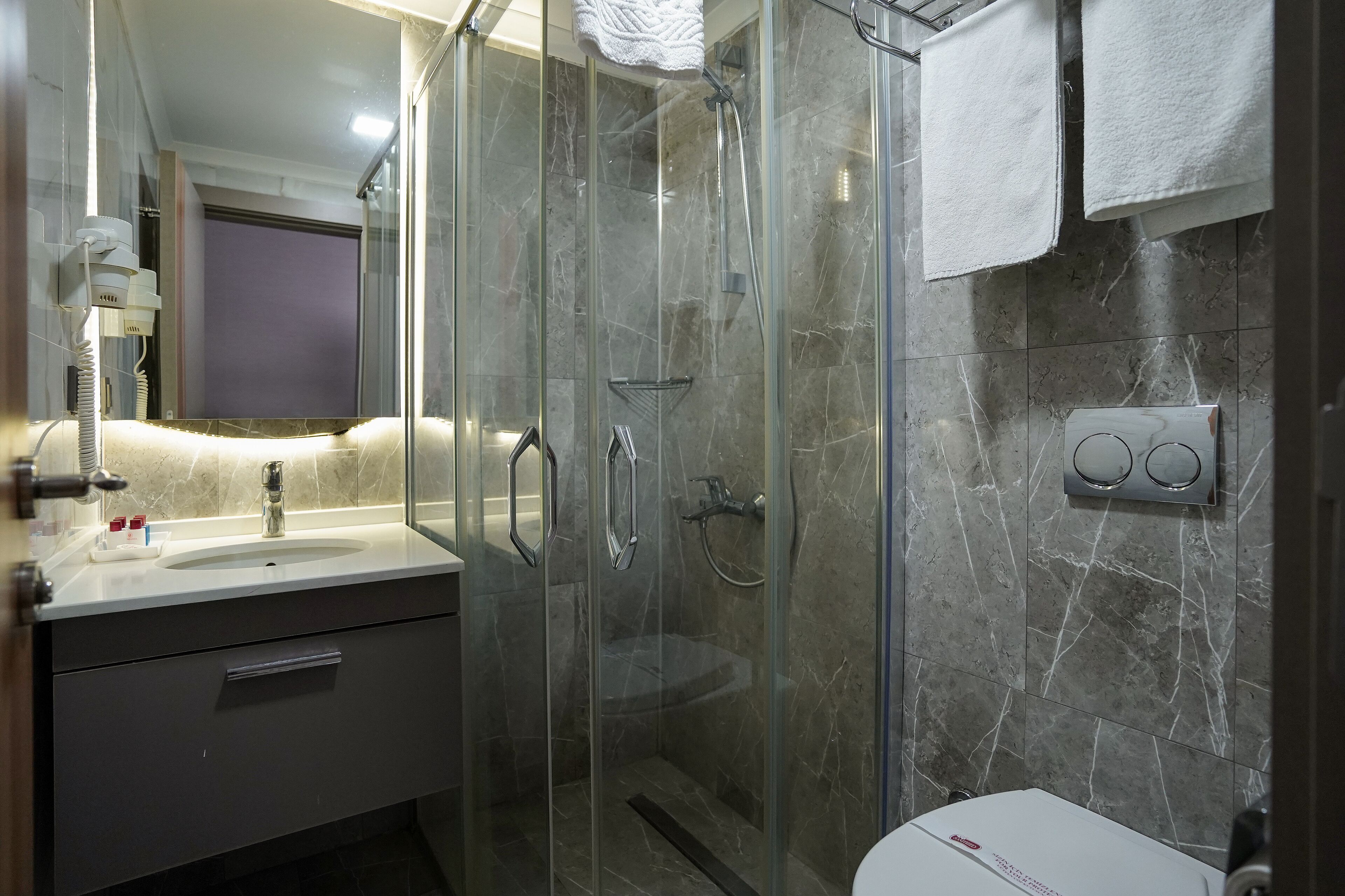 shower, free toiletries, hair dryer, slippers