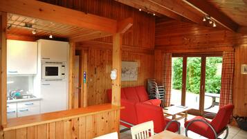 Bungalow, 3 Bedrooms | Living area | TV, DVD player