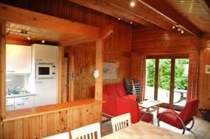 Bungalow, 3 Bedrooms | Living area | TV, DVD player