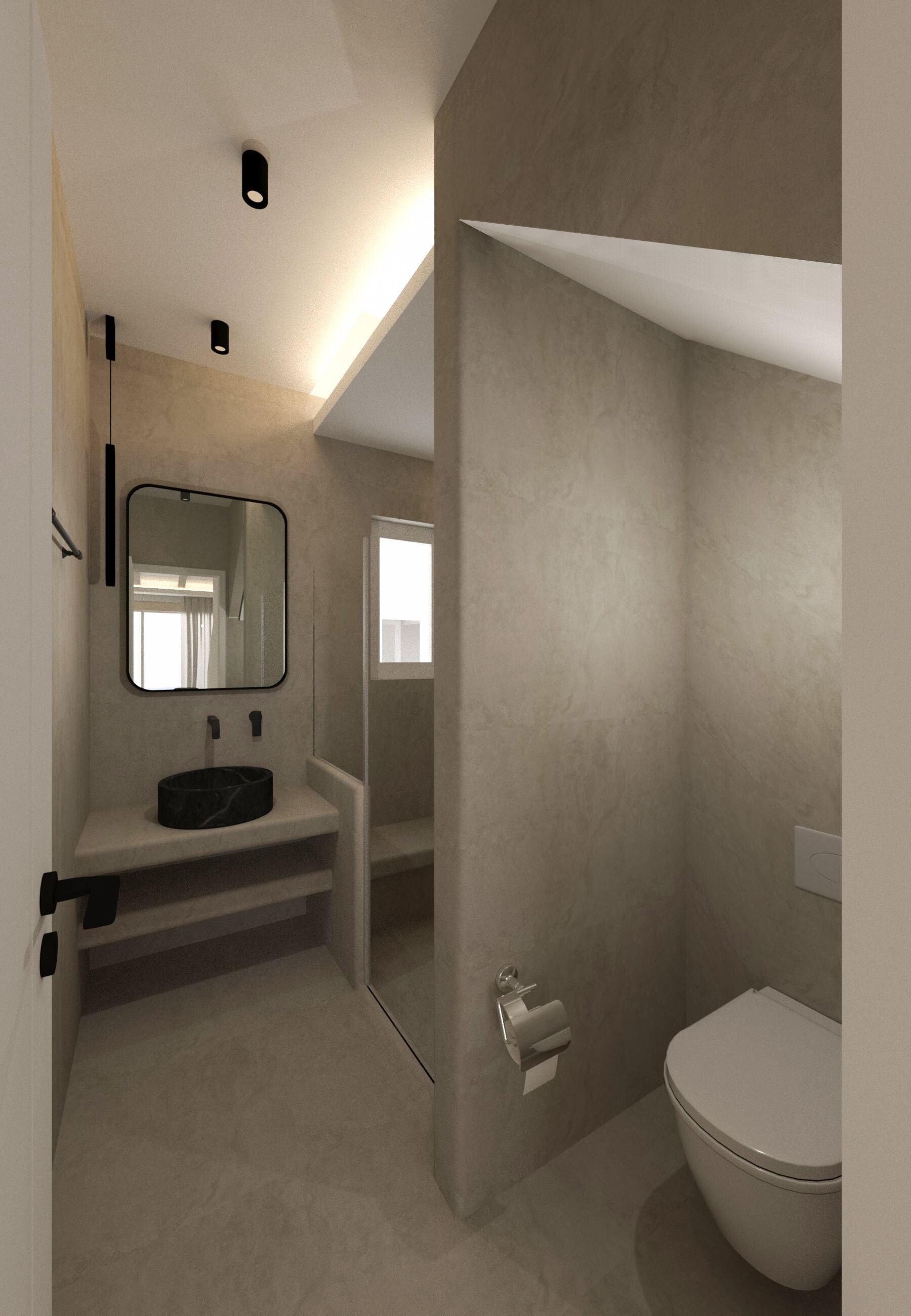 A modern bathroom with a round sink, a toilet, and a mirror.
