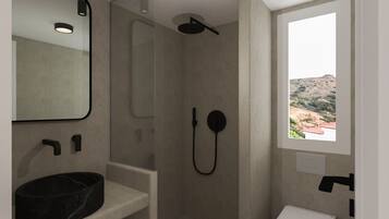 Een moderne badkamer met een grote spiegel, een zwart wastafel, een douche met handdouche en een toilet.