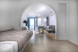 Executive Suite, Sea View | Bathroom | Shower, slippers, towels