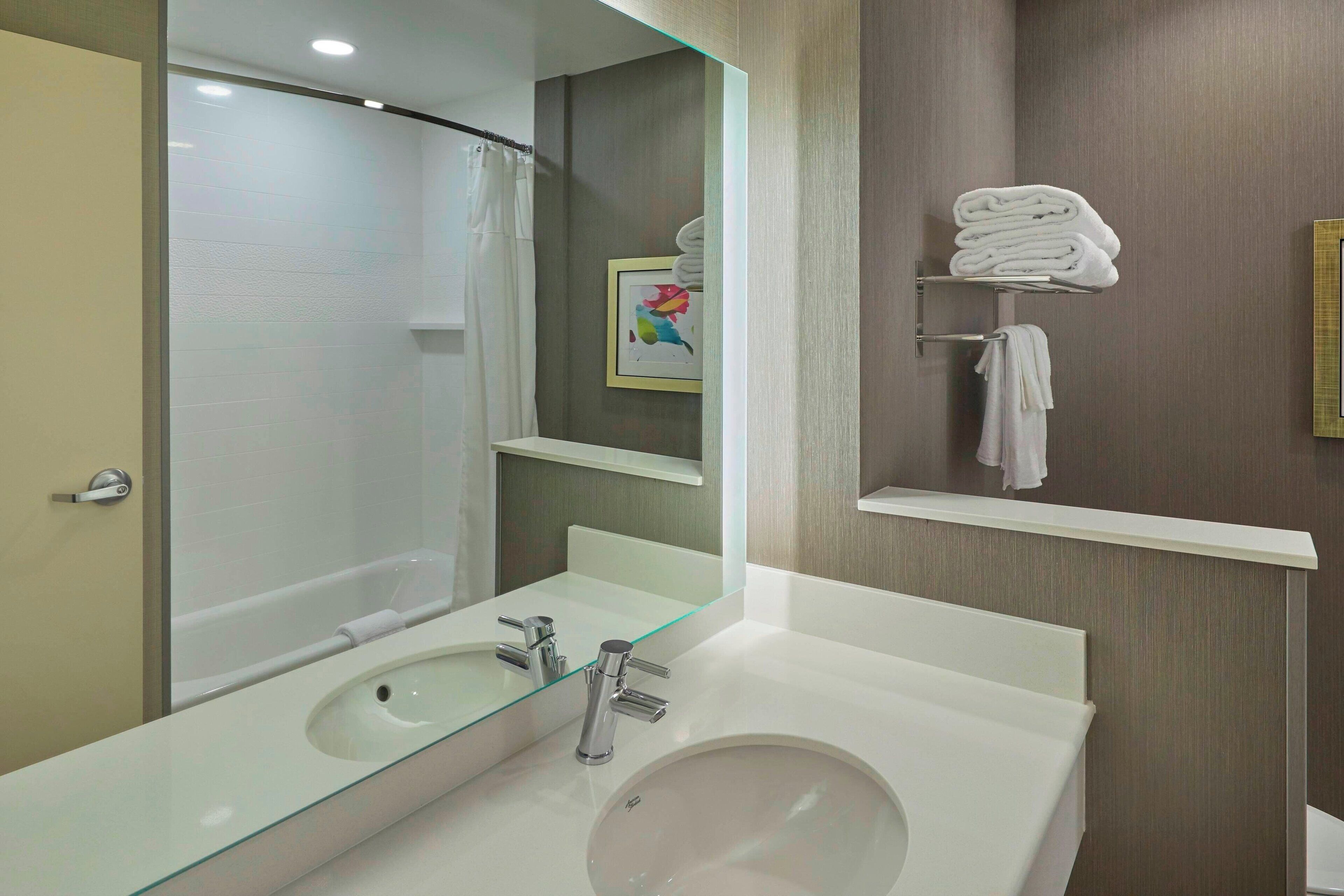 room, 2 queen beds | bathroom | free toiletries, hair dryer, towels, soap