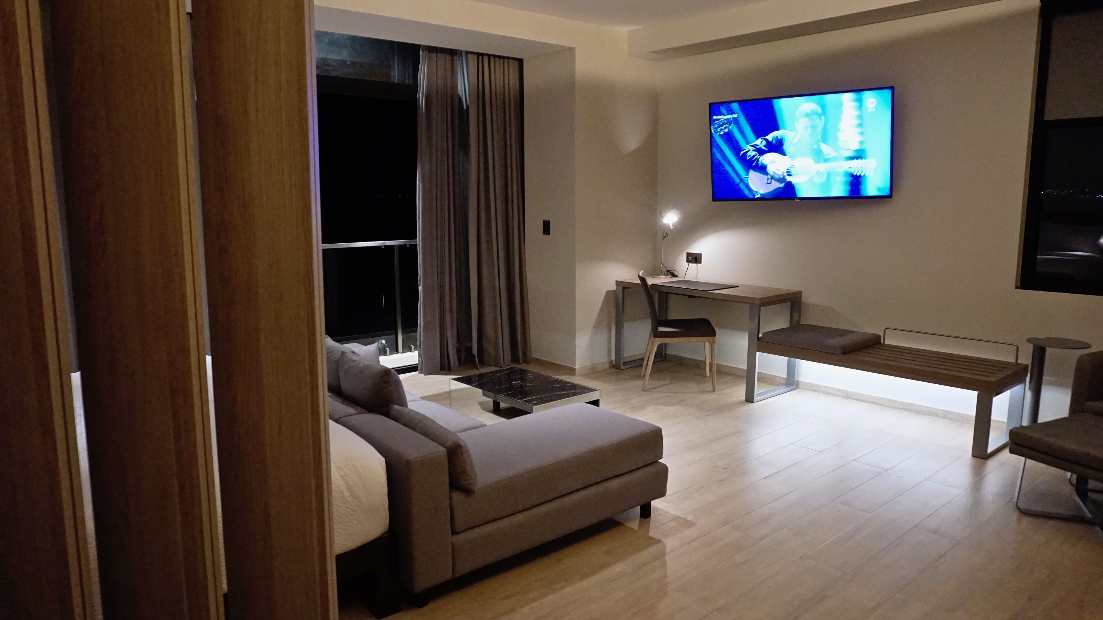 junior suite, 1 king bed, sea view | 1 bedroom, premium bedding, minibar, in-room safe
