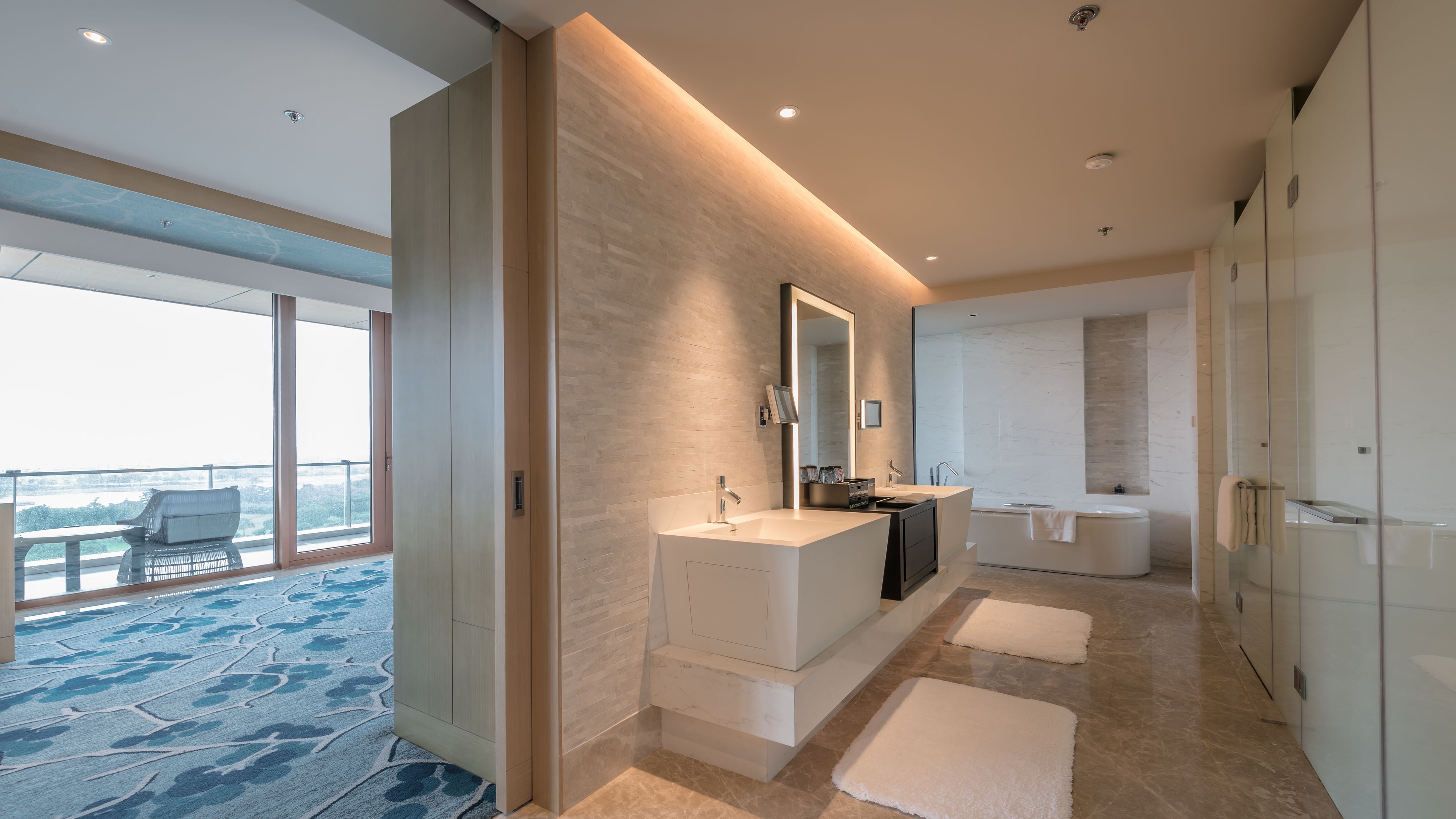 separate bathtub and shower, designer toiletries, hair dryer, bathrobes