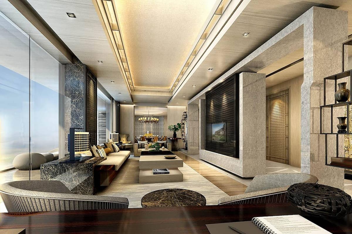 A modern living room with a sofa set, coffee table, and a fireplace.