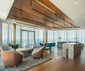 Coffres-forts dans les chambres, bureau, fer et planche à repasser