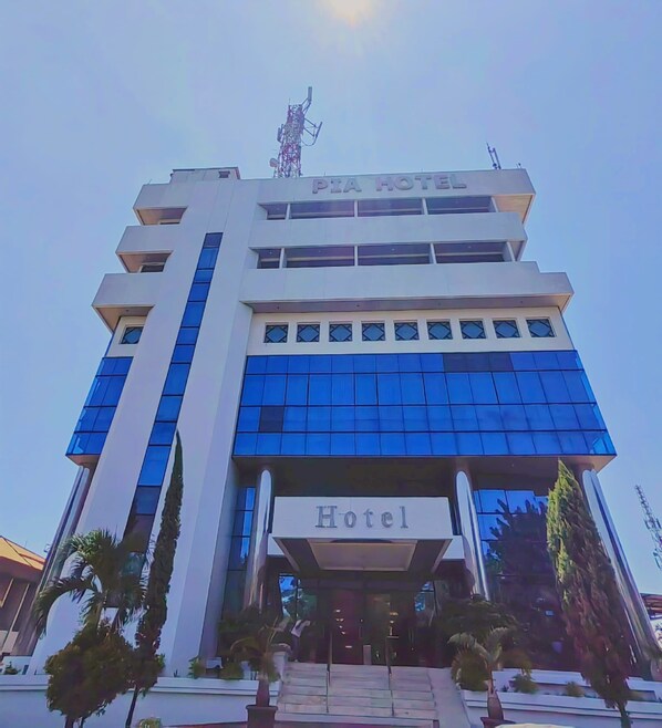 A hotel with a modern design, featuring a prominent 'PIA HOTEL' sign at the top. - PIA Hotel Bandung (Bandung)