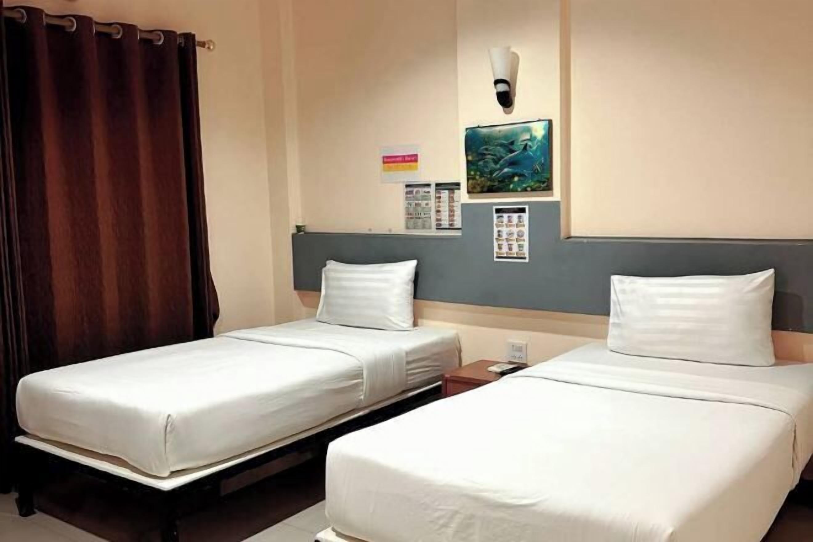 Desk, blackout curtains, free WiFi, bed sheets