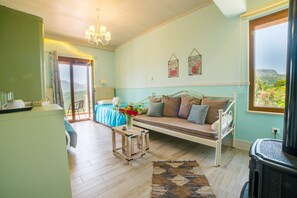 Deluxe Room, Balcony (Psiloritis) | Living area | 29-inch flat-screen TV with cable channels, TV - Aravanes (Amari)