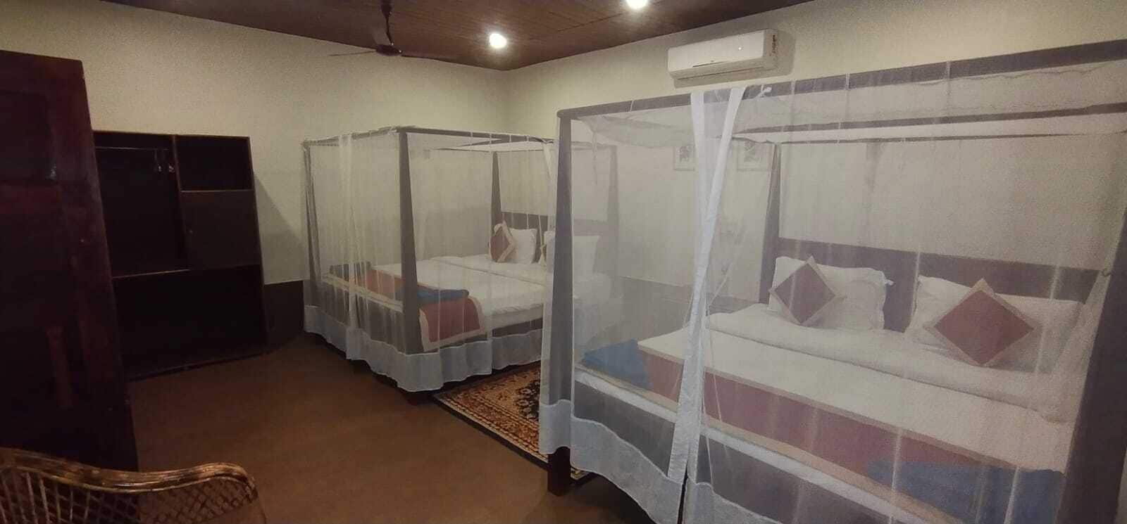 Deluxe-Vierbettzimmer | Zimmersafe, kostenloses WLAN, Bettwäsche