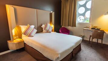Premium bedding, desk, blackout curtains, soundproofing