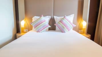 Premium bedding, desk, blackout drapes, soundproofing