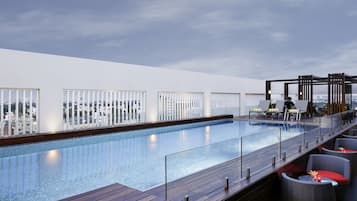 Outdoor pool, pool umbrellas, pool loungers