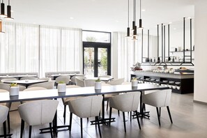 Daily buffet breakfast (USD 18.00 per person)