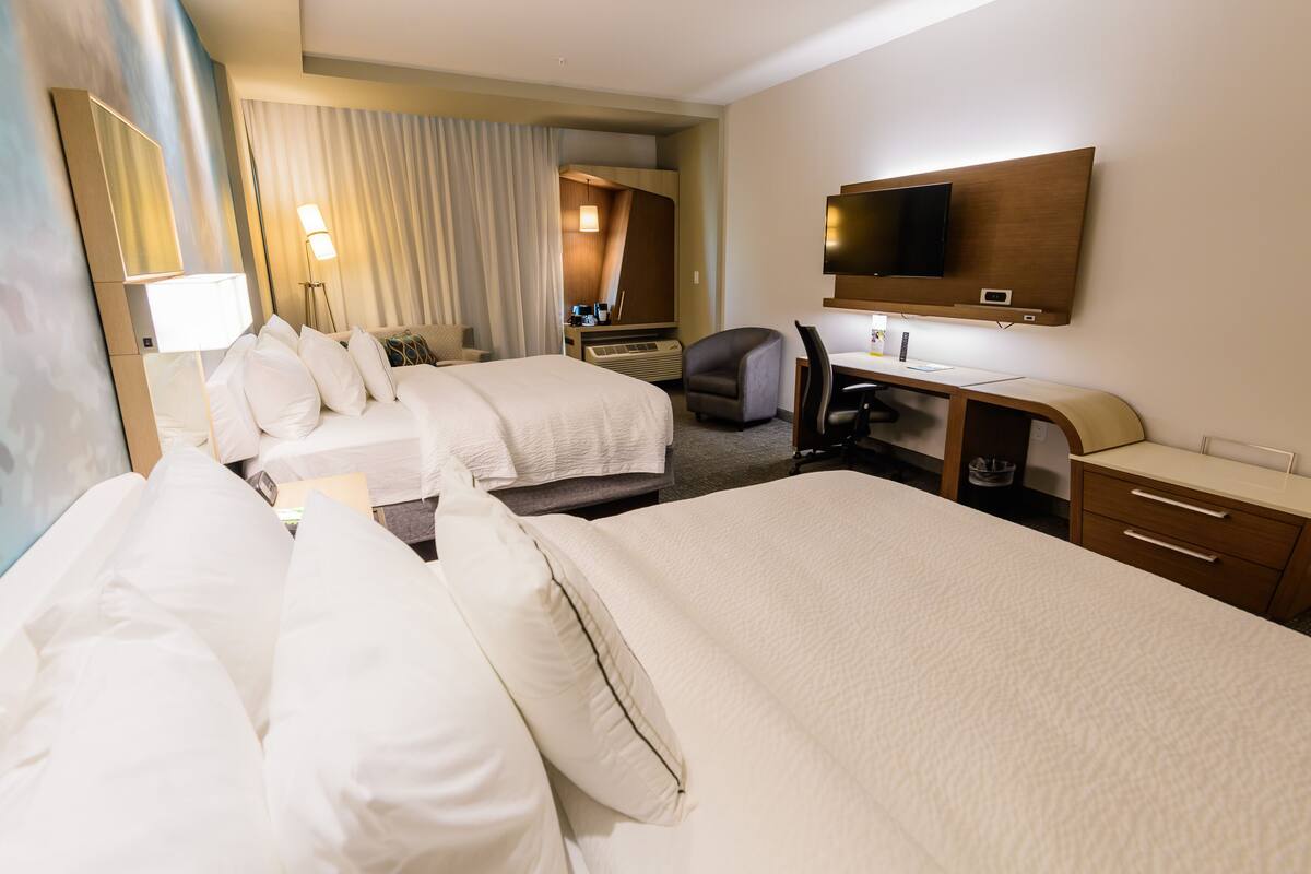 desk, laptop workspace, blackout curtains, iron/ironing board