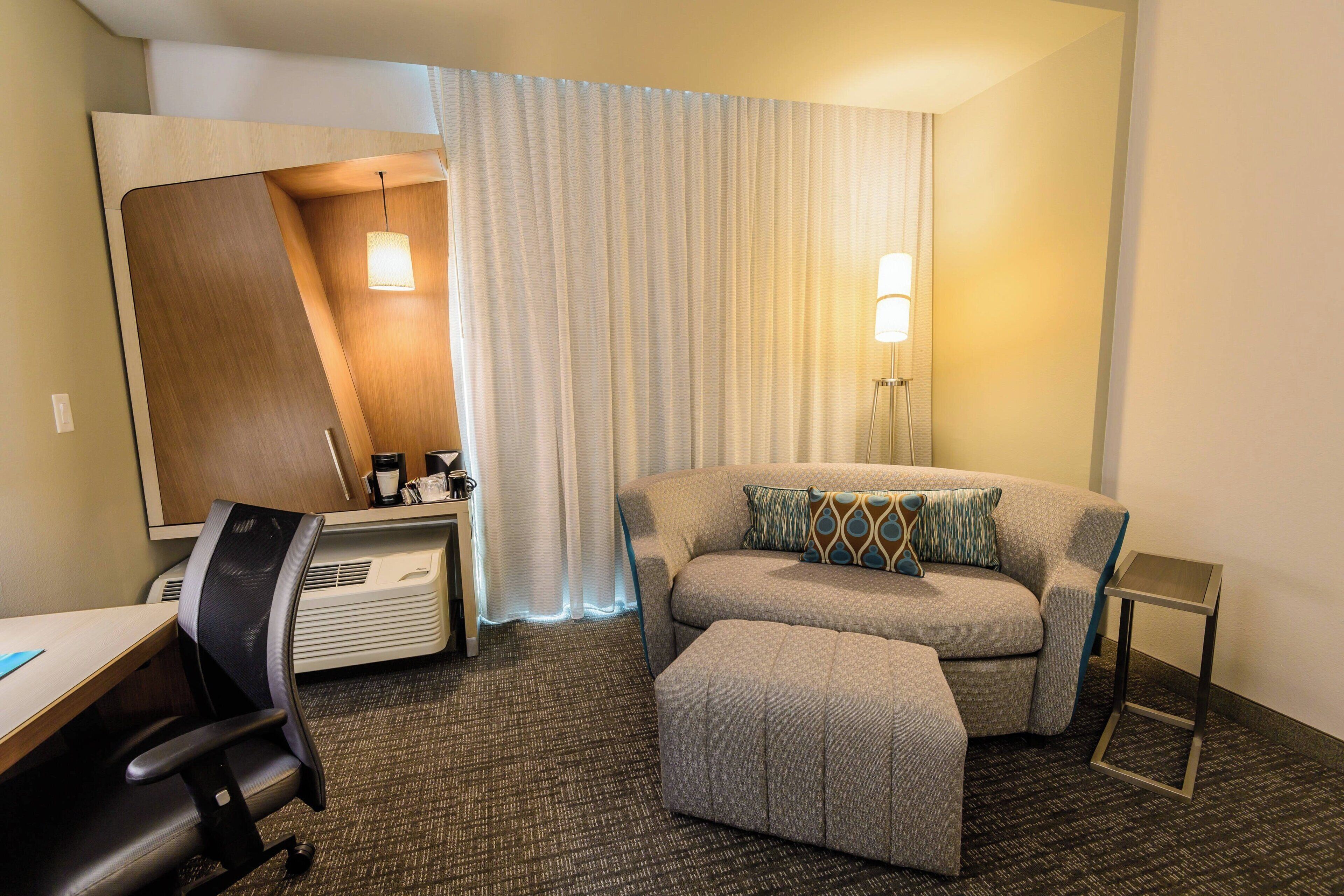 desk, laptop workspace, blackout curtains, iron/ironing board