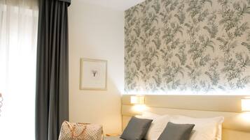 Ropa de cama de alta calidad y minibar