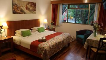 Habitación estándar, 1 cama King size | 1 habitación, edredón, camas Select Comfort y minibar