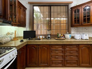 Réfrigérateur dans l'espace commun, micro-ondes dans l'espace commun