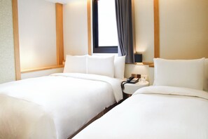 Deluxe Triple Room, Multiple Beds | Desk, blackout drapes, soundproofing, free WiFi - INNK Hotel (Taichung)