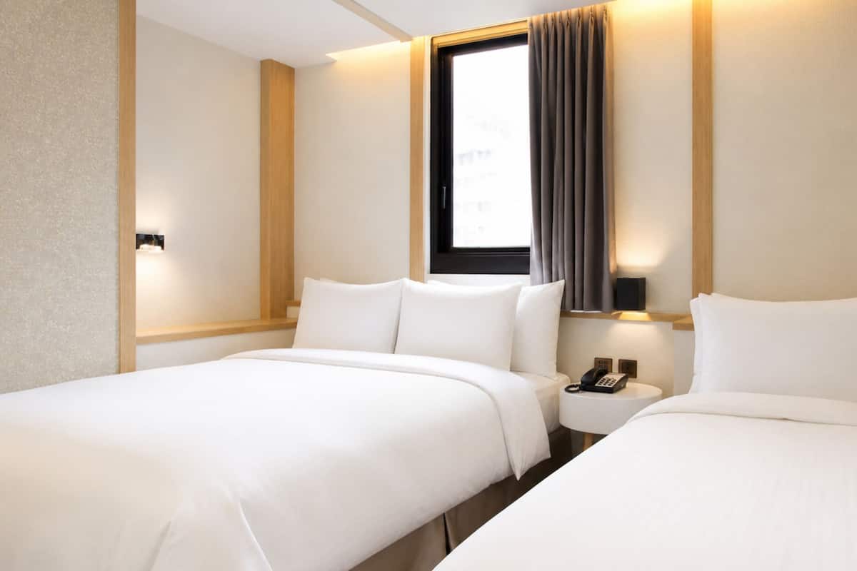 Deluxe Triple Room, Multiple Beds | Desk, blackout drapes, soundproofing, free WiFi