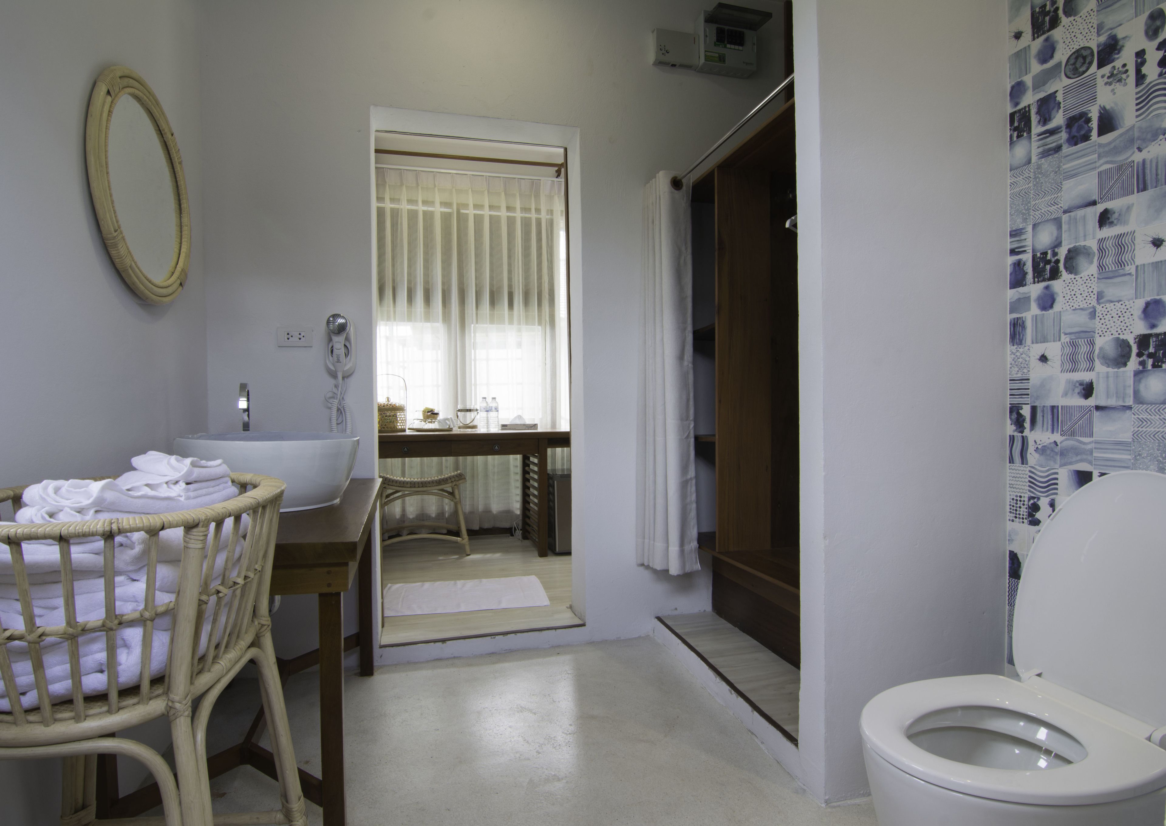 deluxe villa | bathroom | shower, rainfall showerhead, free toiletries, towels