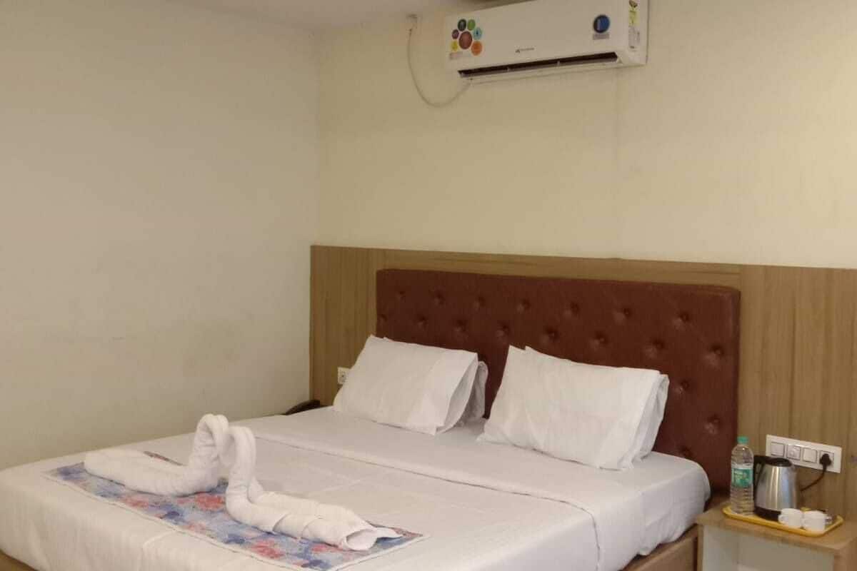 Deluxe Room | Memory foam beds, individually decorated, desk, laptop workspace