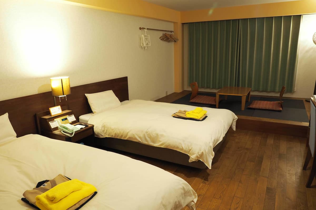 twin room, ocean view | down duvets, in-room safe, free wifi, bed sheets