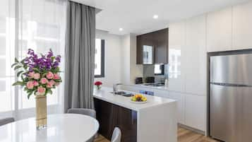 2 Bedroom Luxury Suite | Private kitchen | Full-size fridge, microwave, oven, stovetop