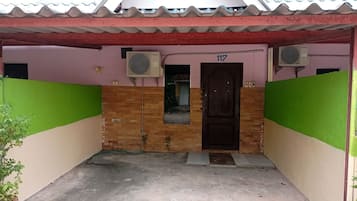 Habitación cuádruple familiar, varias camas, vistas al complejo turístico | Terraza o patio