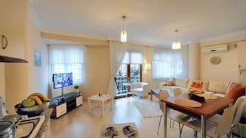 Family Apartment, 2 Bedrooms, Kitchen, City View | Living room | 43-inch flat-screen TV with satellite channels, LED TV