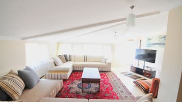 43-inch flat-screen TV with satellite channels, LED TV