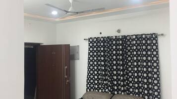 Apartment, 2 Bedrooms | 2 bedrooms, in-room safe, desk, iron/ironing board