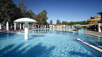 Indoor pool, outdoor pool, pool umbrellas, pool loungers