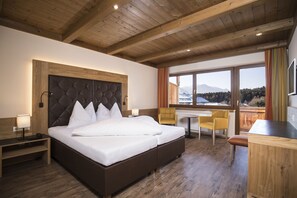 Hypoallergeen beddengoed, een kluis op de kamer, een bureau