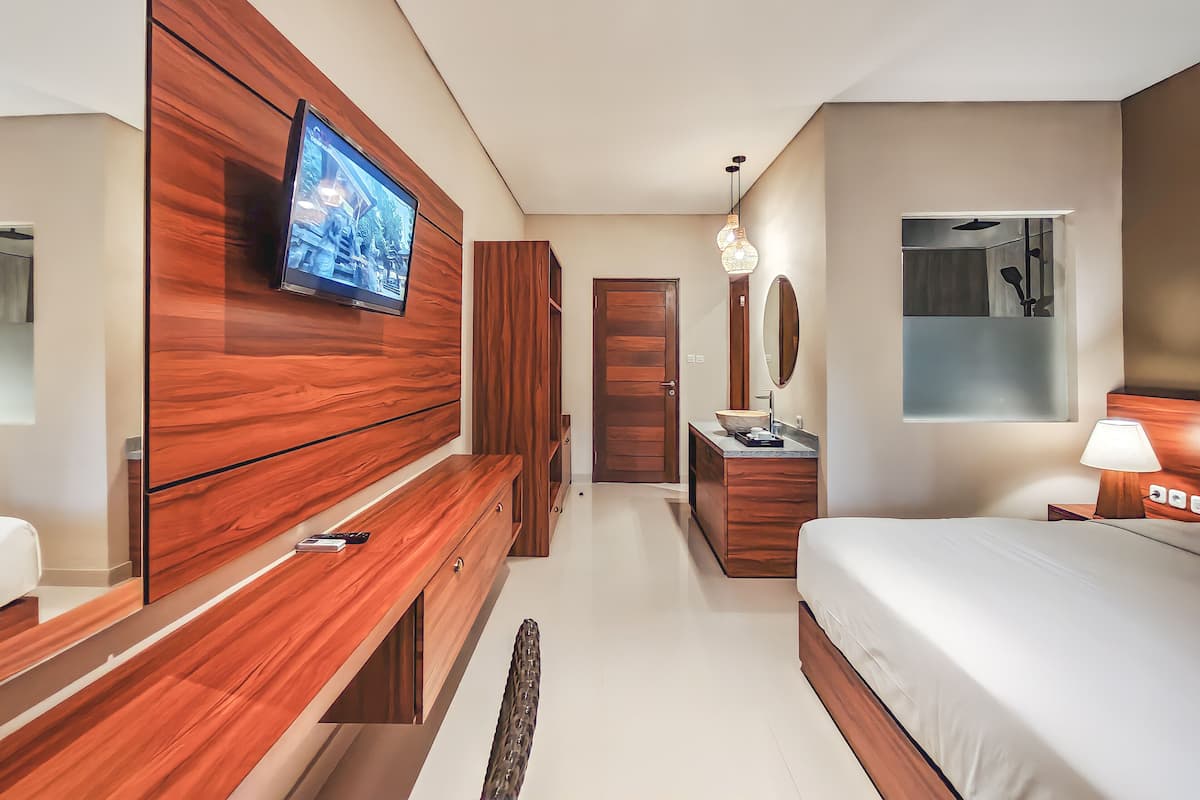 Habitación superior con 1 cama matrimonial o 2 individuales | Ropa de cama de alta calidad y minibar