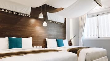 Deluxe Quadruple Room | Blackout drapes, soundproofing, free WiFi, bed sheets